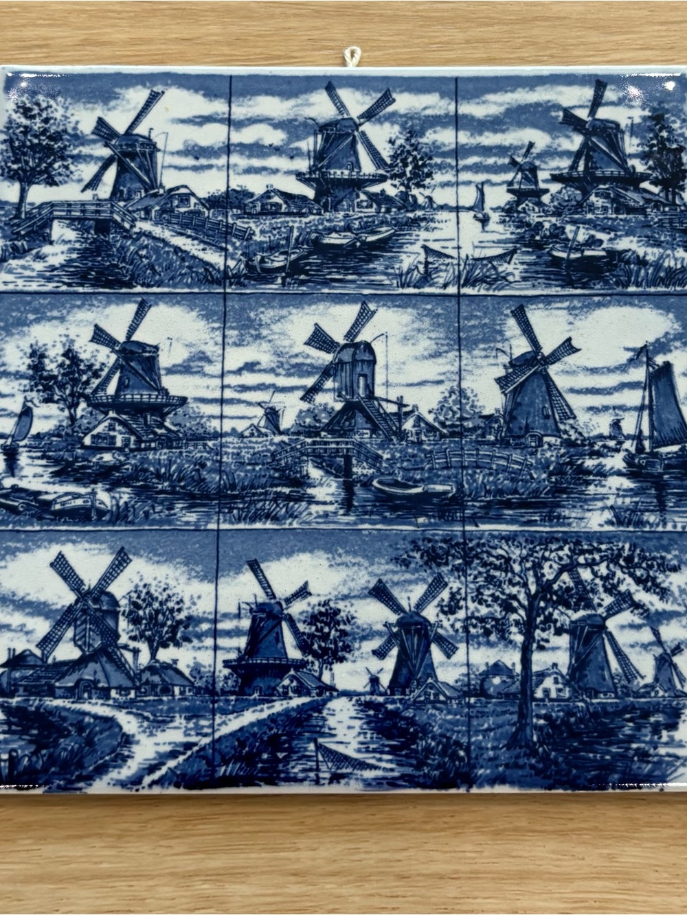 Delft ceramic tile with windmill & boat scene